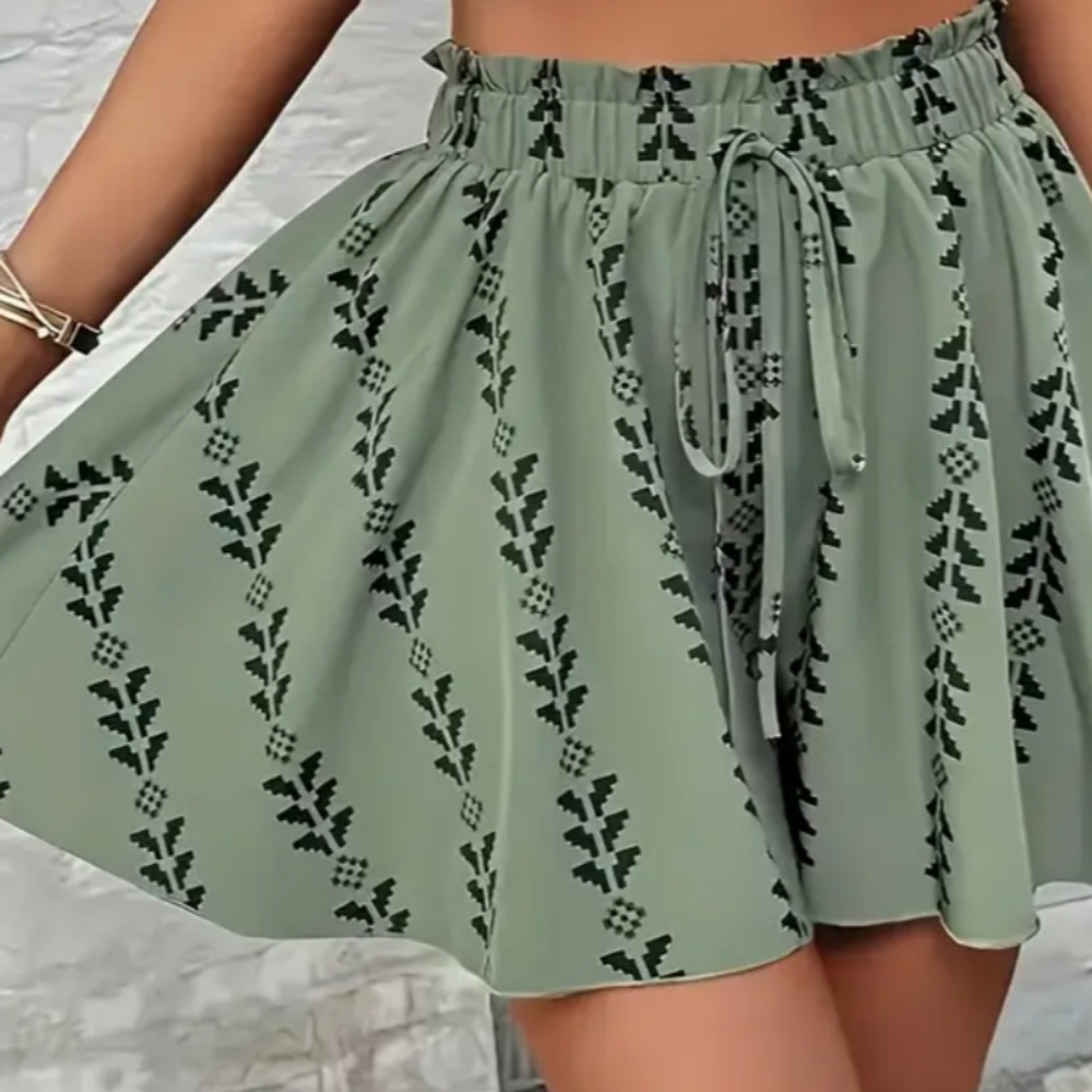 Green Shorts with Black Floral Pattern